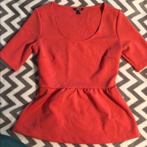 Coral peplum top